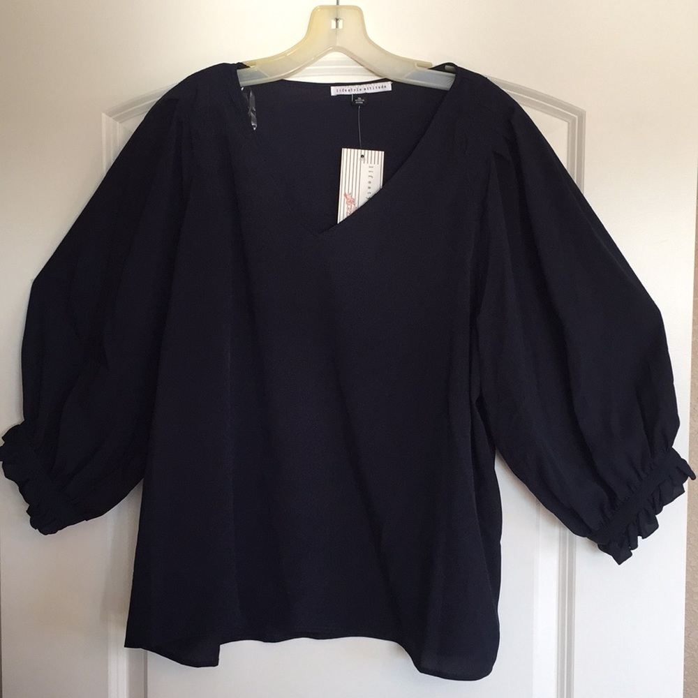 New with tags Women’s blouse.